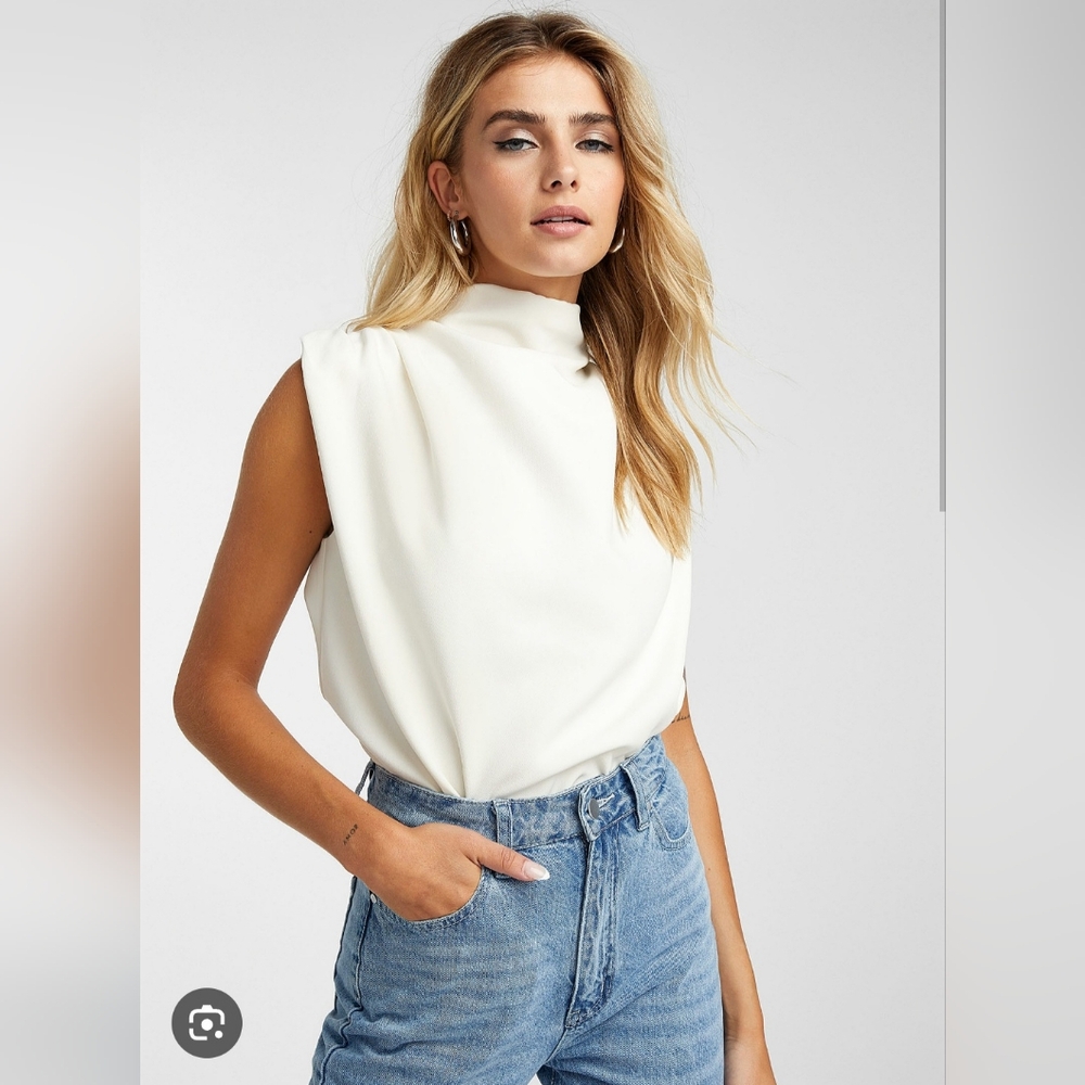 White sleeveless top